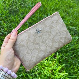 Coach Large Wristlet In Signature Canvas pink